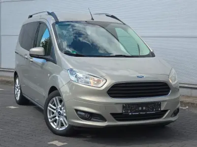 Gebraucht Ford Tourneo Courier Titanium 101 PS (74 kW) 2014 Silber Van / Kleinbus
