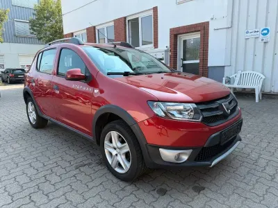 Gebraucht Dacia Sandero Prestige 90 PS (66 kW) 2015 Orange Limousine