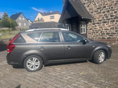 Gebraucht Kia Ceed Sportswagon Edition 7 116 PS (85 kW) 2012 Grau Kombi