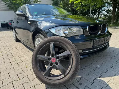 Gebraucht BMW 116 122 PS (89 kW) 2010 Schwarz Kleinwagen