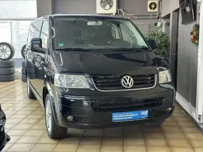 Second-hand VW Multivan Sportline 174 CP (127 kW) 2009 Negru Monovolum