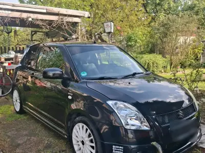 Używany Suzuki Swift 102 KM (75 kW) 2005 Czarny Hatchback