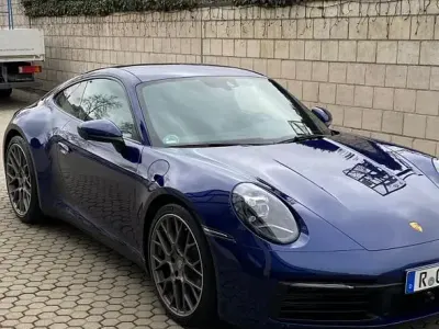 Gebraucht Porsche 911 Carrera 4 385 PS (283 kW) 2023 Blau Coupé