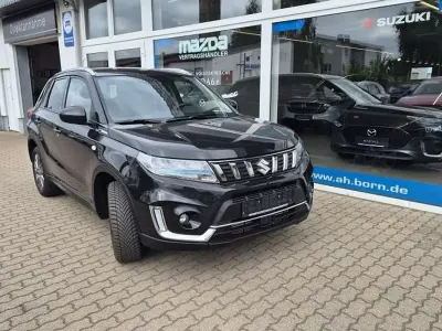 Gebraucht Suzuki Vitara Comfort 131 PS (96 kW) 2023 Cosmic black pearl met. SUV