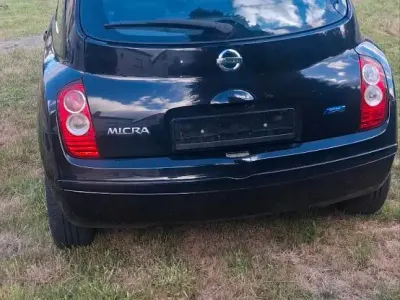 Gebraucht Nissan Micra 65 PS (47 kW) 2010 Schwarz Kleinwagen