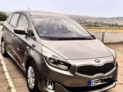 Gebraucht Kia Carens DREAM-TEAM Edition 116 PS (85 kW) 2014 Silber Van / Kleinbus