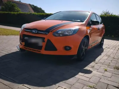 Gebraucht Ford Focus 115 PS (84 kW) 2011 Orange Kombi