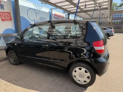 Gebraucht VW Fox 54 PS (39 kW) 2009 Schwarz Kleinwagen