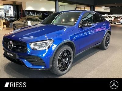 Gebraucht Mercedes GLC300e AMG 320 PS (235 kW) 2021 Metalliclack spektralblau Coupé