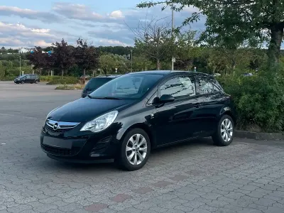 Gebraucht Opel Corsa Active 69 PS (50 kW) 2013 Schwarz Kleinwagen