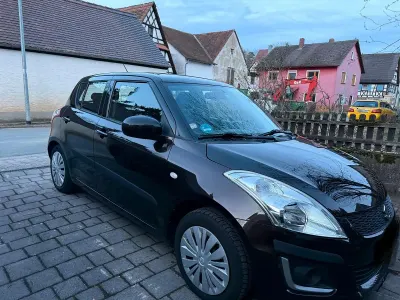 Usata Suzuki Swift 94 CV (69 kW) 2013 Marrone Utilitaria