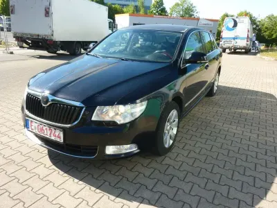 Używany Skoda Superb Ambition 125 KM (91 kW) 2009 Czarny Sedan/Limuzyna