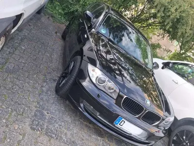 Gebraucht BMW 116 122 PS (89 kW) 2010 Schwarz Kleinwagen