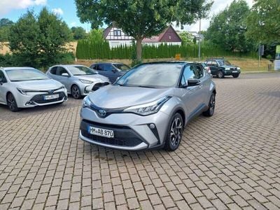 Shimmeringsilber metallic/ dach schwarz Gebraucht 2023 Toyota C-HR Team SUV | 29.990 € (Fairer Preis)