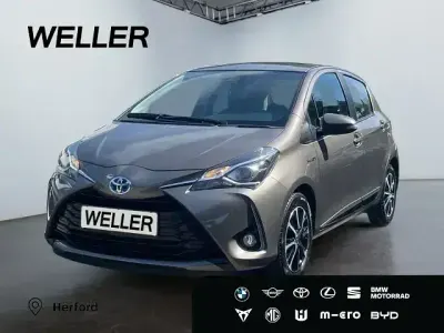 Brugt Toyota Yaris Hybrid Team 101 HK (74 kW) 2018 Brun Hatchback