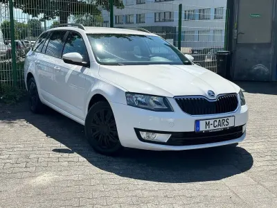 Gebraucht Skoda Octavia Ambition 105 PS (77 kW) 2014 Weiß Kombi
