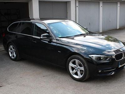 Second-hand BMW 318 Sport Line 150 CP (110 kW) 2015 Negru Break