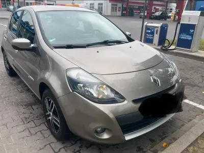Używany Renault Clio II 75 KM (55 kW) 2011 Brązowy Sedan/Limuzyna