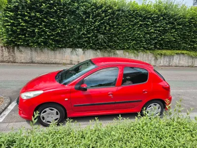 Gebraucht Peugeot 206+ 2011 Rot Kleinwagen