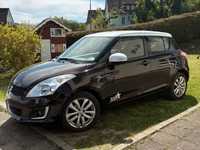 Gebraucht Suzuki Swift 94 PS (69 kW) 2014 Braun Kleinwagen