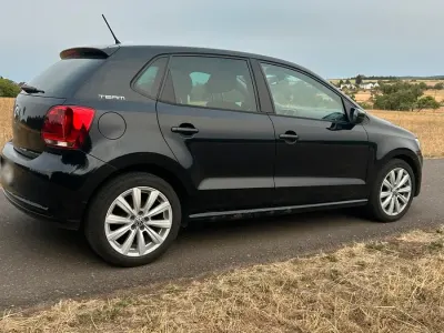 Gebraucht VW Polo Team 88 PS (64 kW) 2011 Schwarz Kleinwagen