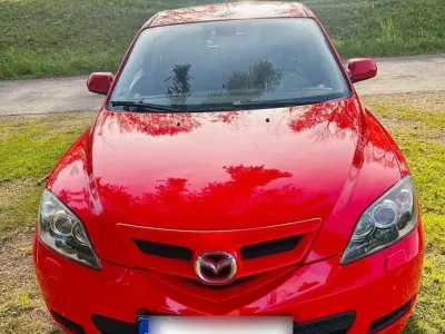 Używany Mazda 3 105 KM (77 kW) 2009 Czerwony Hatchback