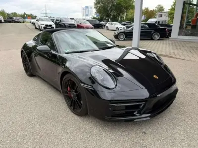 Gebraucht Porsche 992 480 PS (353 kW) 2023 Tiefschwarzmetallic Coupé