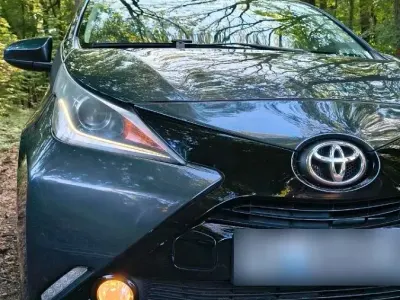 Używany Toyota Aygo 69 KM (50 kW) 2014 Szary Hatchback