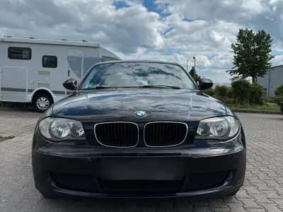 Gebraucht BMW 116 116 PS (85 kW) 2010 Schwarz Kleinwagen
