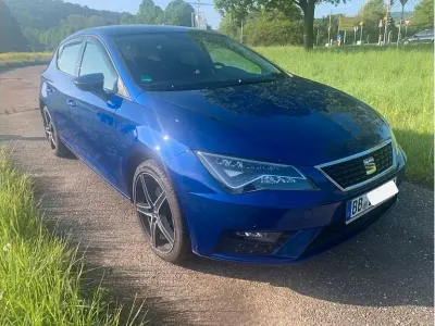 Używany Seat Leon 110 KM (80 kW) 2018 Niebieski Sedan/Limuzyna