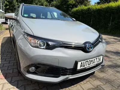 Gebraucht Toyota Auris Hybrid Style 136 PS (100 kW) 2018 Cement grey Kombi