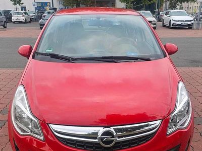 Używany Opel Corsa 95 KM (69 kW) 2012 Czerwony Hatchback
