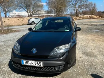 Używany Renault Laguna III 110 KM (80 kW) 2010 Czarny Sedan/Limuzyna