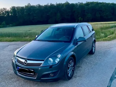 Gebraucht Opel Astra 125 PS (91 kW) 2010 Grau Kombi