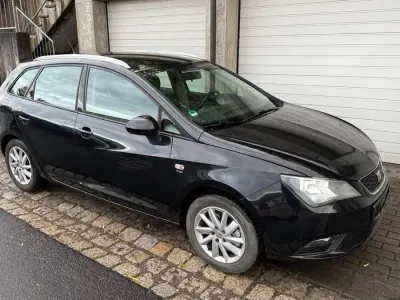 Używany Seat Ibiza ST 105 KM (77 kW) 2013 Czarny Kombi