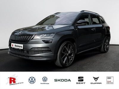 Grau Gebraucht 2021 Skoda Karoq SportLine SUV | 27.389 € (Guter Preis)