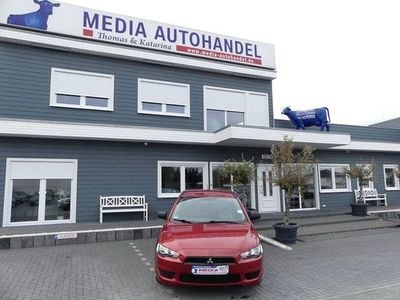 Gebraucht Mitsubishi Lancer Inform 109 PS (80 kW) 2010 Rot Limousine