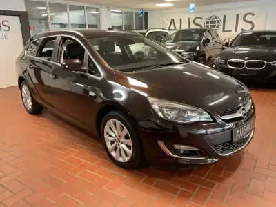 Gebraucht Opel Astra Exklusiv 140 PS (102 kW) 2015 Mahagonibraun/darkmahagony Kombi