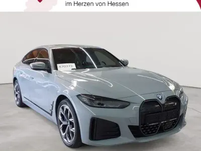 Gebraucht BMW i4 M Sport 250 kW (340 PS) 2023 M brooklyn grau metallic Limousine