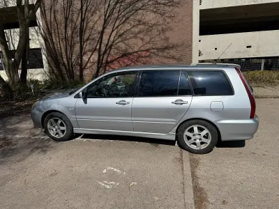Occasion Mitsubishi Lancer 99 PK (72 kW) 2003 Zilver Stationwagen