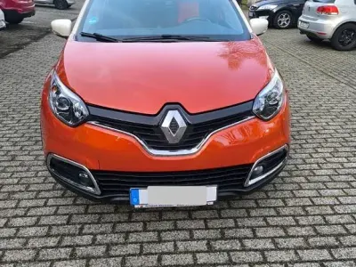 Używany Renault Captur Luxe 120 KM (88 kW) 2015 Pomarańczowy SUV