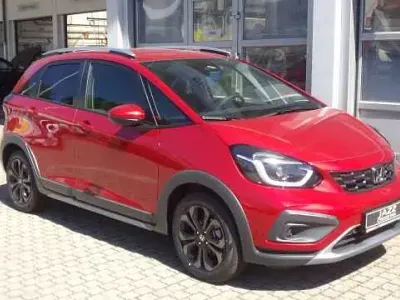 Gebraucht Honda Jazz Advance 107 PS (78 kW) 2025 Premium crystal red Kleinwagen