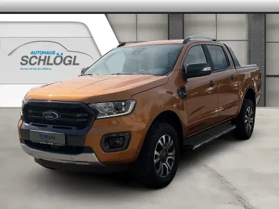 Gebraucht Ford Ranger Wildtrack 212 PS (155 kW) 2023 Canyonorange metallic (metallic) Pickup