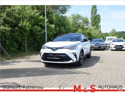 Gebraucht Toyota C-HR Team 184 PS (135 kW) 2023 Platinumweiß perleffekt/ dach schwarz SUV