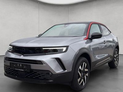 Gebraucht Opel Mokka 131 PS (96 kW) 2024 Kontrast grau metallic SUV