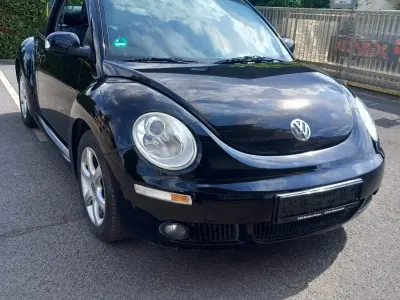 Gebraucht VW New Beetle 115 PS (84 kW) 2006 Schwarz Kleinwagen