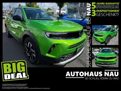 Gebraucht Opel Mokka Elegance 101 PS (74 kW) 2023 Matcha green SUV