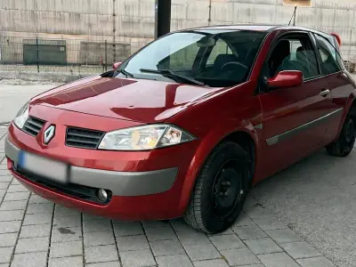 Używany Renault Mégane 95 KM (69 kW) 2004 Czerwony Hatchback