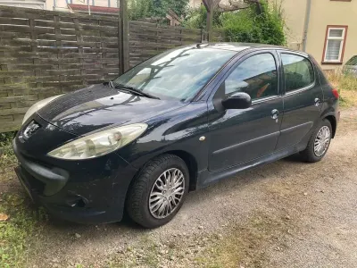 Gebraucht Peugeot 206 60 PS (44 kW) 2009 Schwarz Limousine