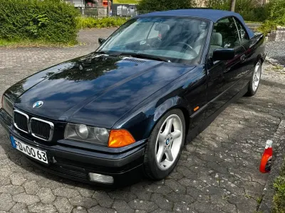 Gebraucht BMW 318 Cabriolet Basis 115 PS (84 kW) 1999 Blau Cabrio